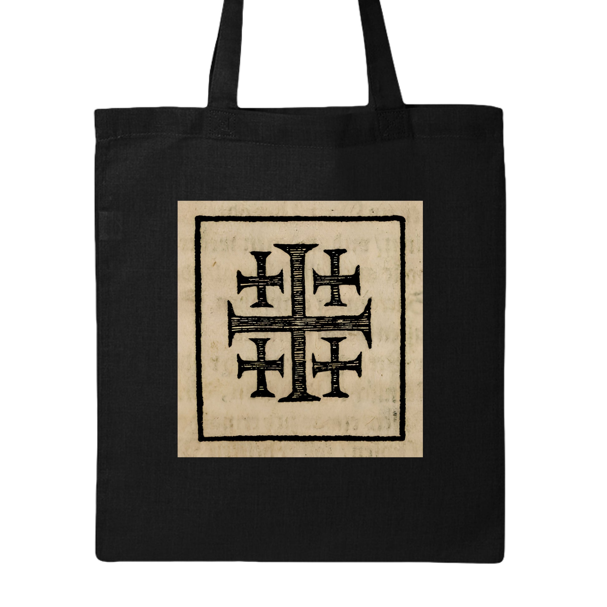 A black canvas tote bag with two shoulder straps, featuring a square beige graphic on the front with a black ornamental cross design.