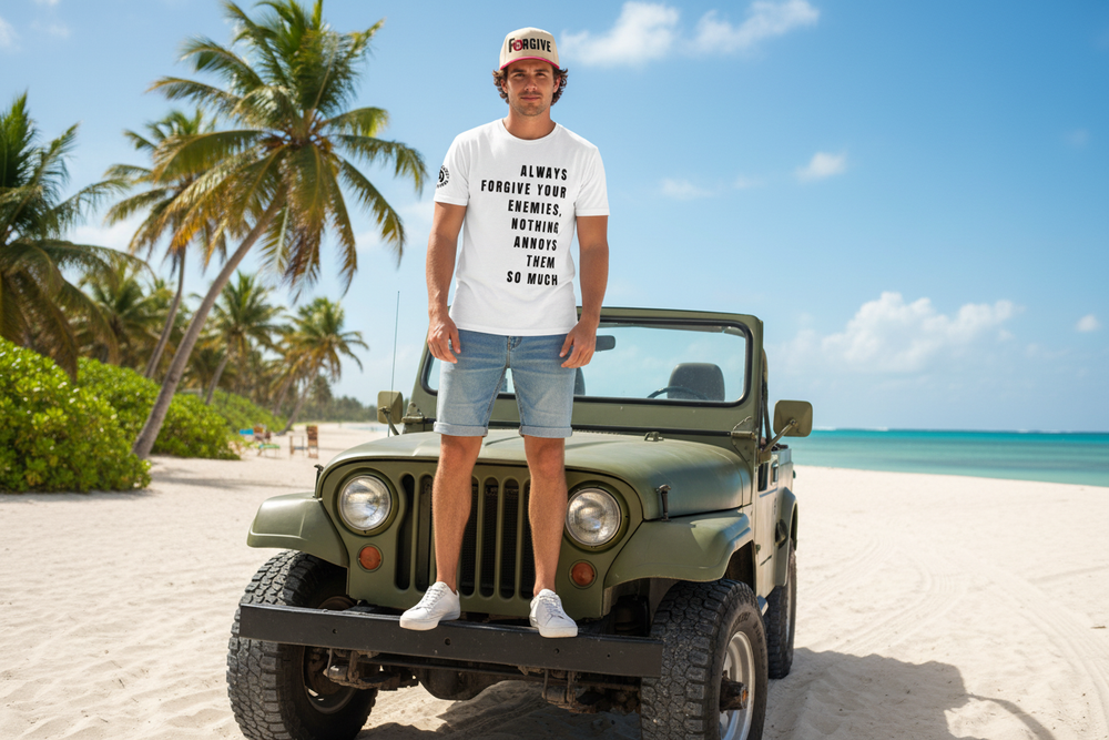 Male model on jeep hood wearing Forgive tee and hat